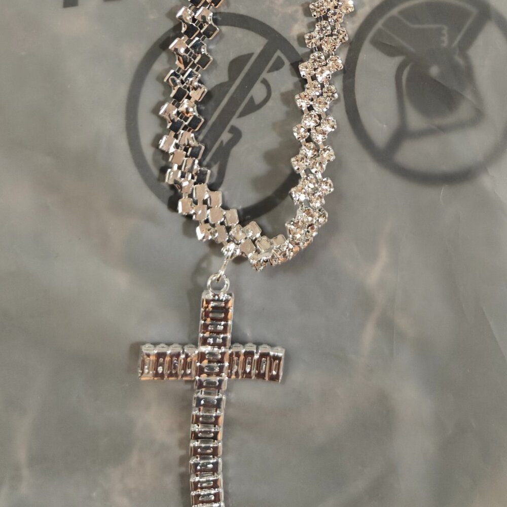 Silver plated thick chain with flexible/bendable cross with glass chips. New